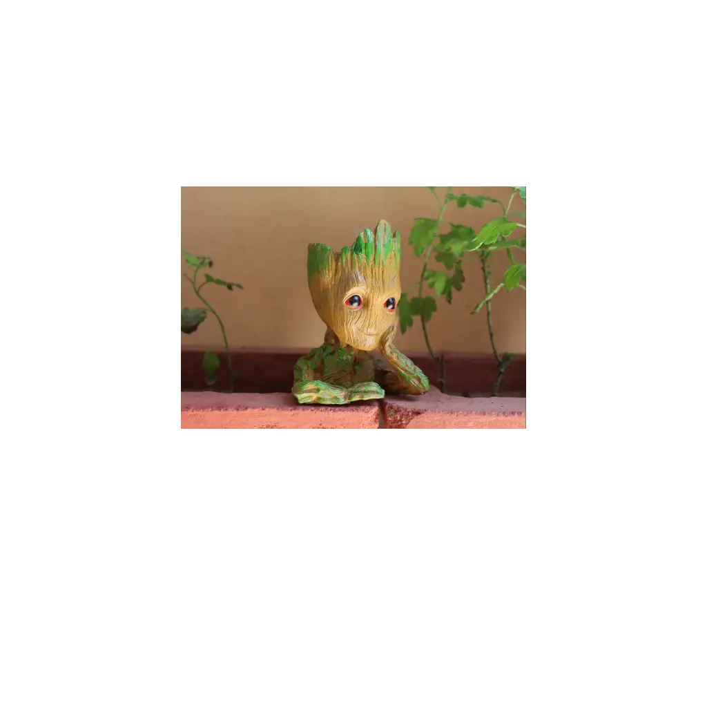 Resin Brown And Green Groot Thinking Plastic Showpiece, For Decoration, Packaging Type: Box